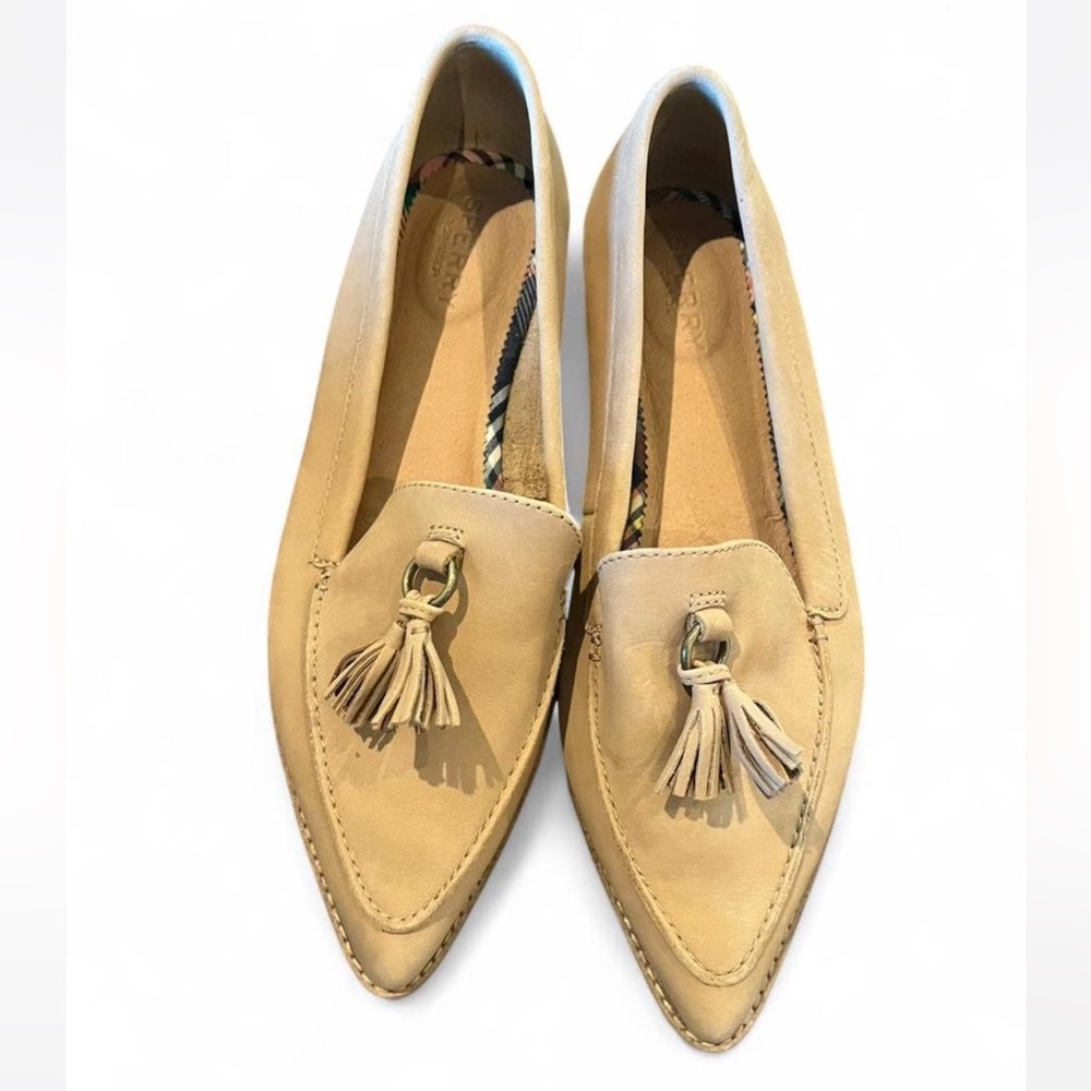 Sperry Saybrook Slip On Leather Loafers in a tan or beige color with tassel